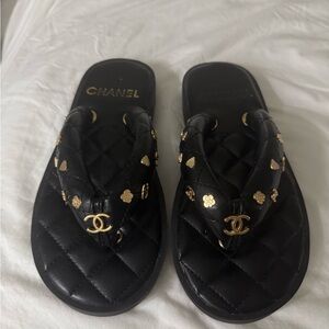 CHANEL Black Quilted Sandals with Gold Details